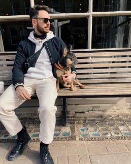 Men's fashion shot with frenhcie dog.